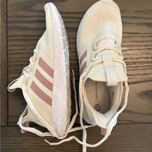 Pink and white adidas cloud foam tennis shoes